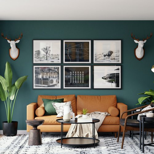 brown sofa in room with teal walls
